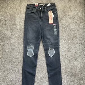 Levi’s size 27 distressed grey denim jeans